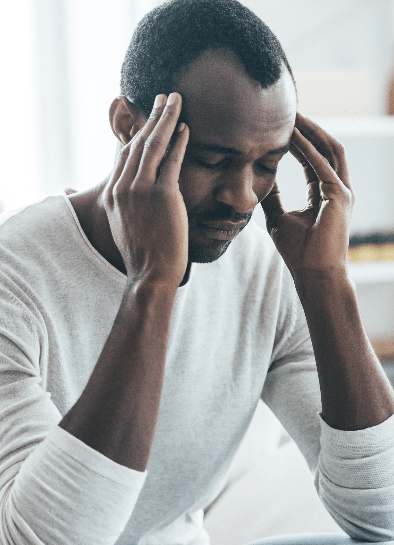 Man with headache. Headache chiropractor in Washington, DC can help this man and his pain.